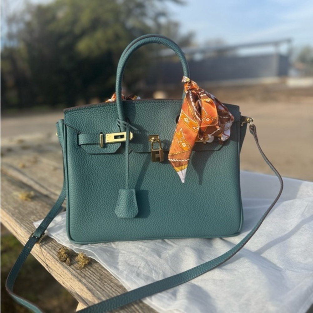 Elegant Green and Orange Satchel with Gold Accents